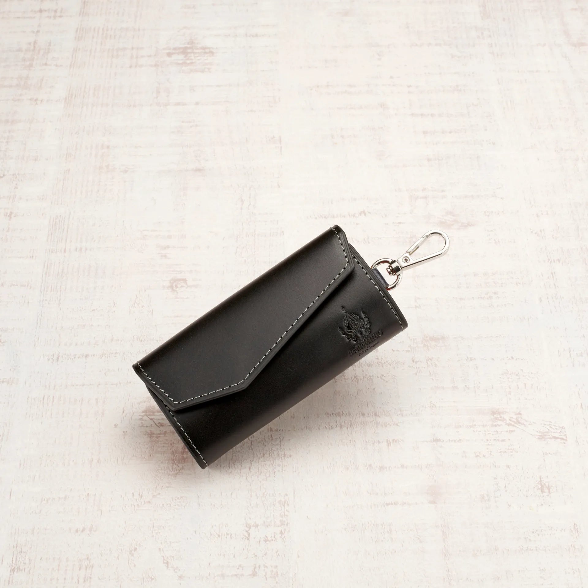 アトリエ・ヒロ ネクストガラス加工レザー スライドキーケース｜便利で