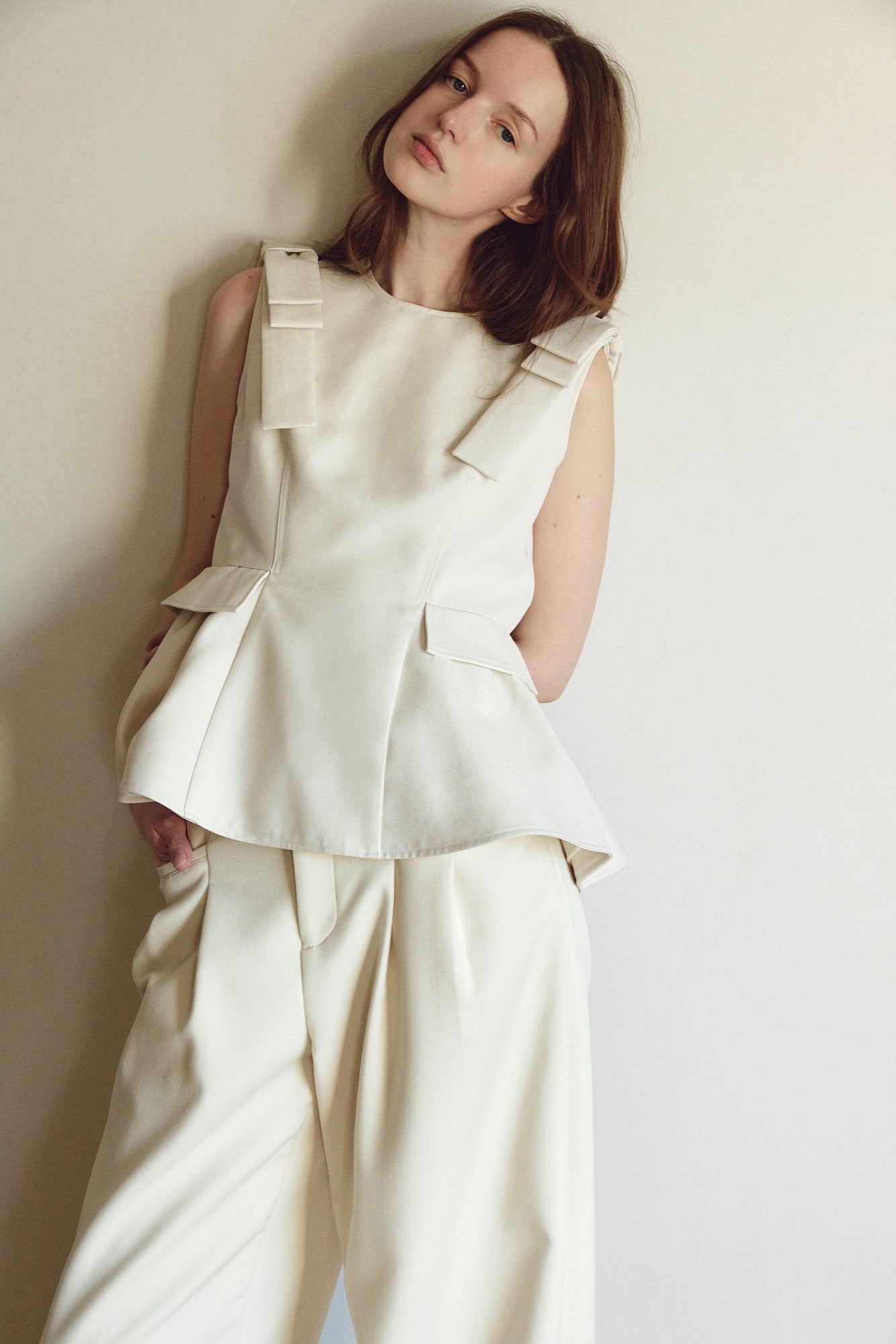 Korinthos Sleeveless Peplum – THE TOÉ