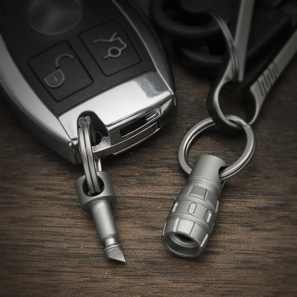 This Quick-Release Titanium Keychain Hides a Box Cutter Inside