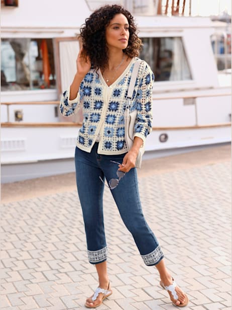 Veste en tricot aspect crochet