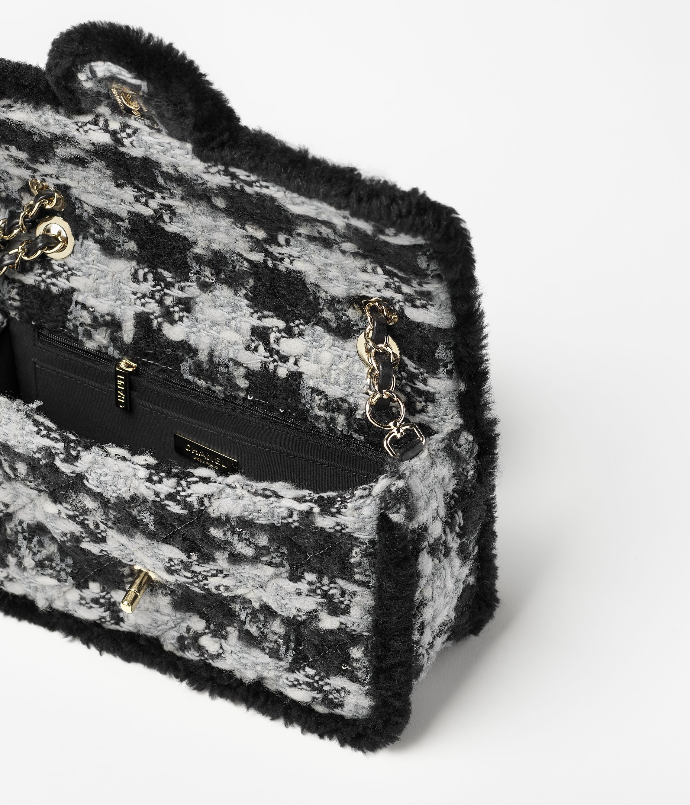 イヤーマフ - シアリング ラムスキン、ブラック & エクリュ