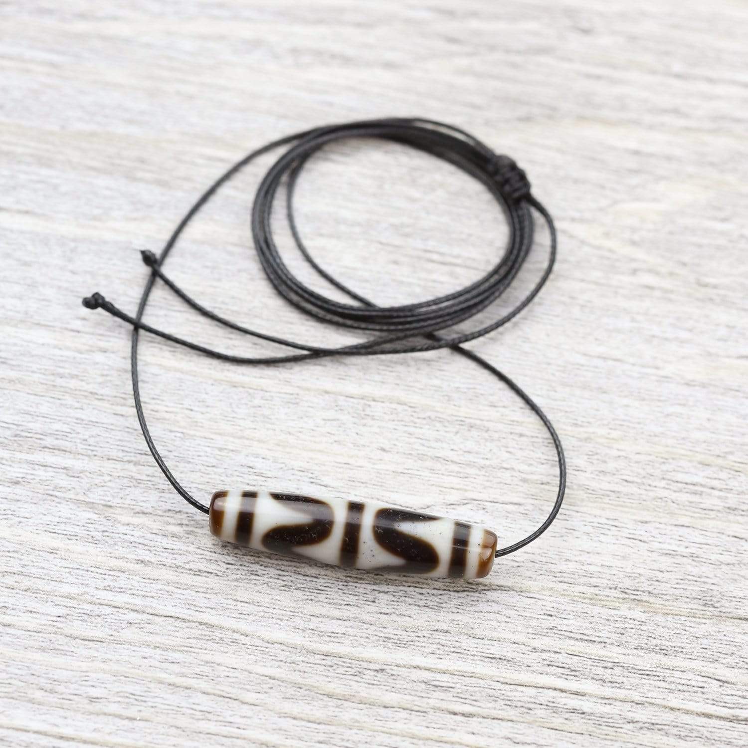 Tiger Tooth Protection Dzi Bead - DharmaShop