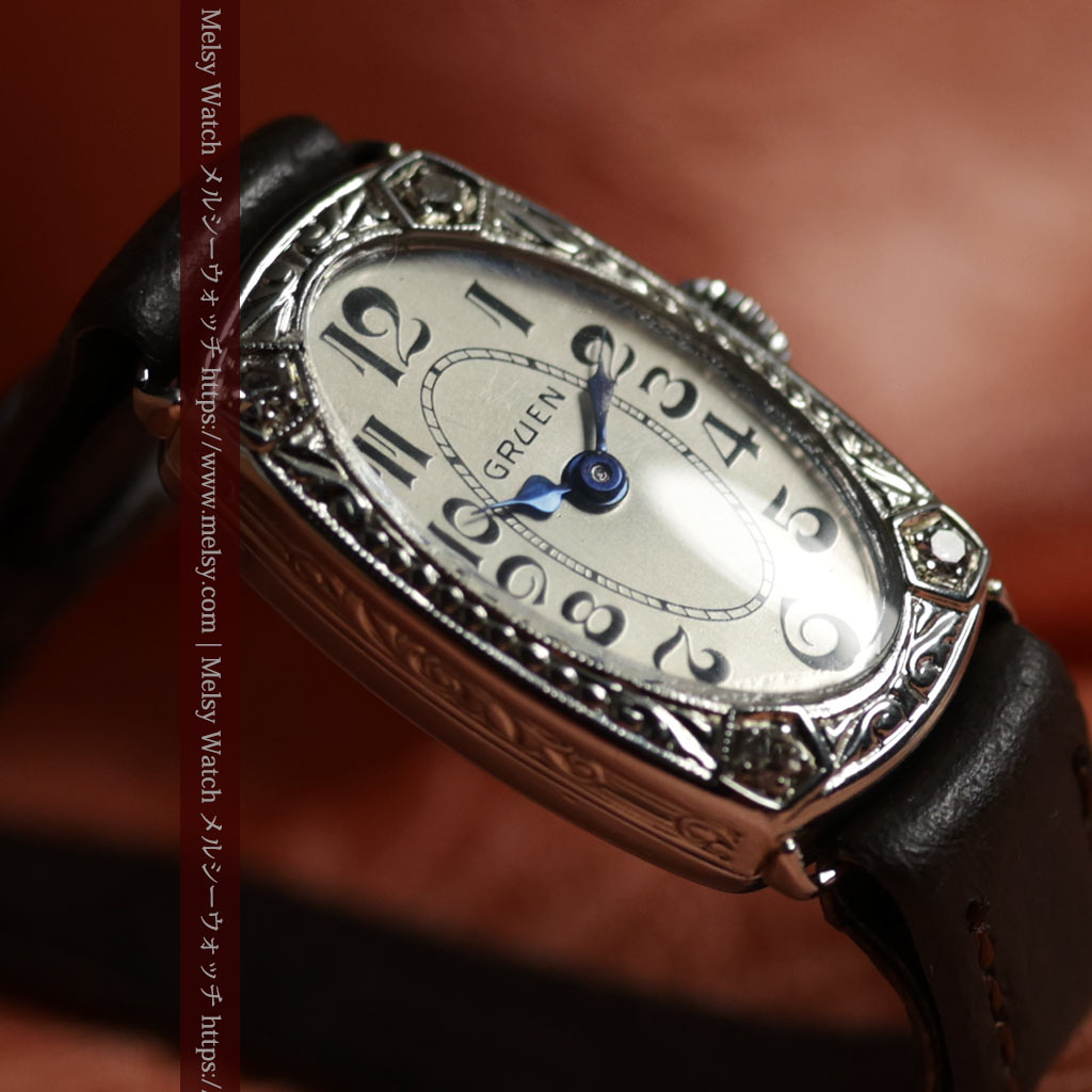 グリュエンの品のある楕円形とダイヤ装飾の金無垢アンティーク腕時計