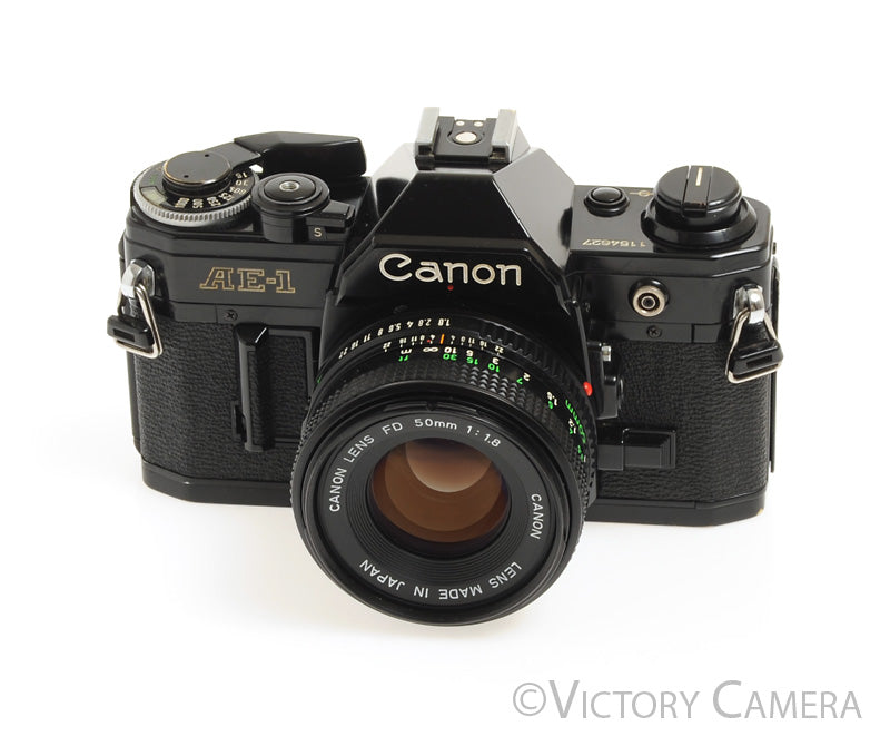 Canon AE-1 35mm Black Film Camera with 50mm f1.8 Lens -New Seals- [EXC