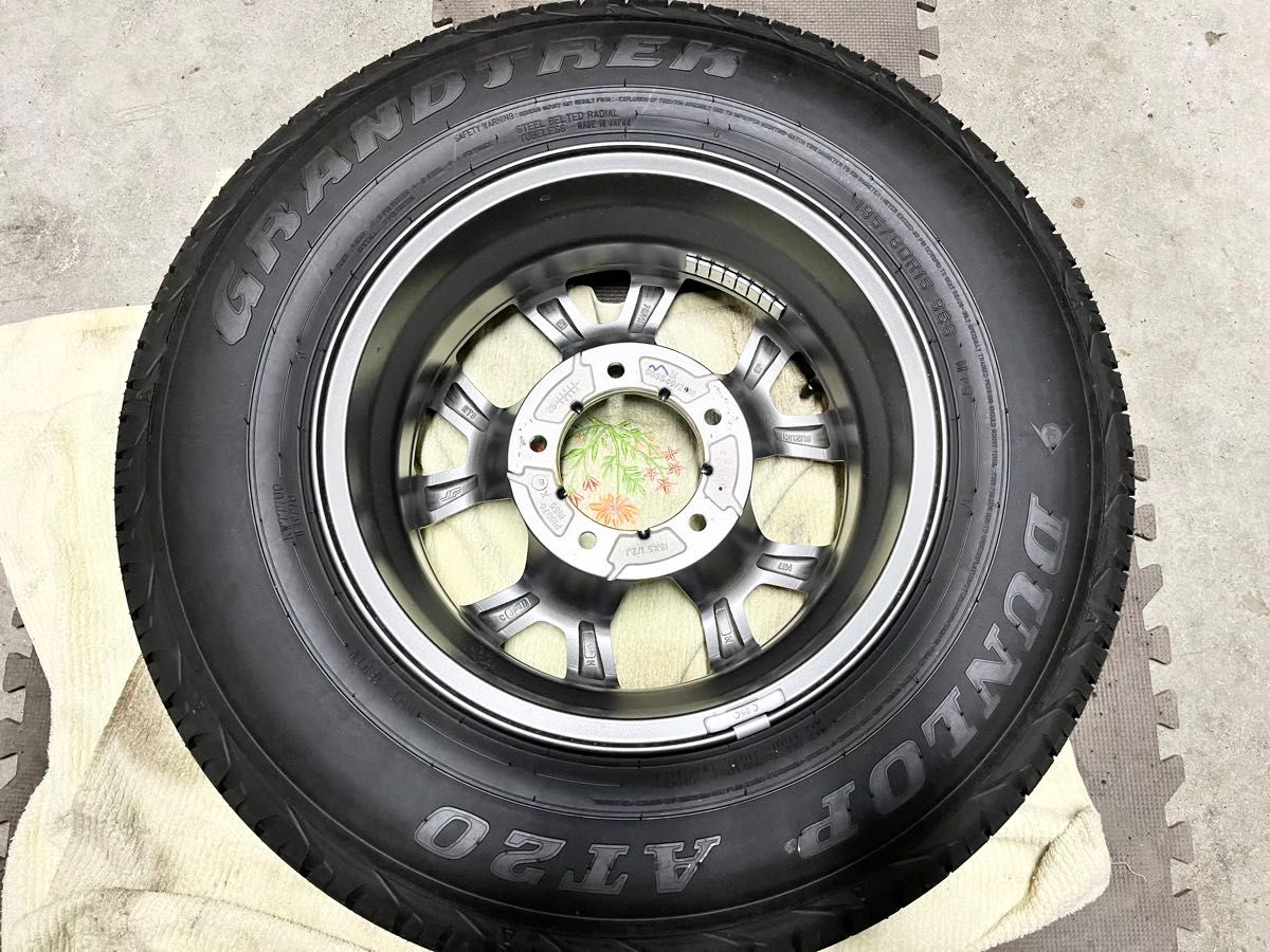 新車外し】スズキ ジムニーノマド 純正アルミホイールタイヤ付 1本 ①
