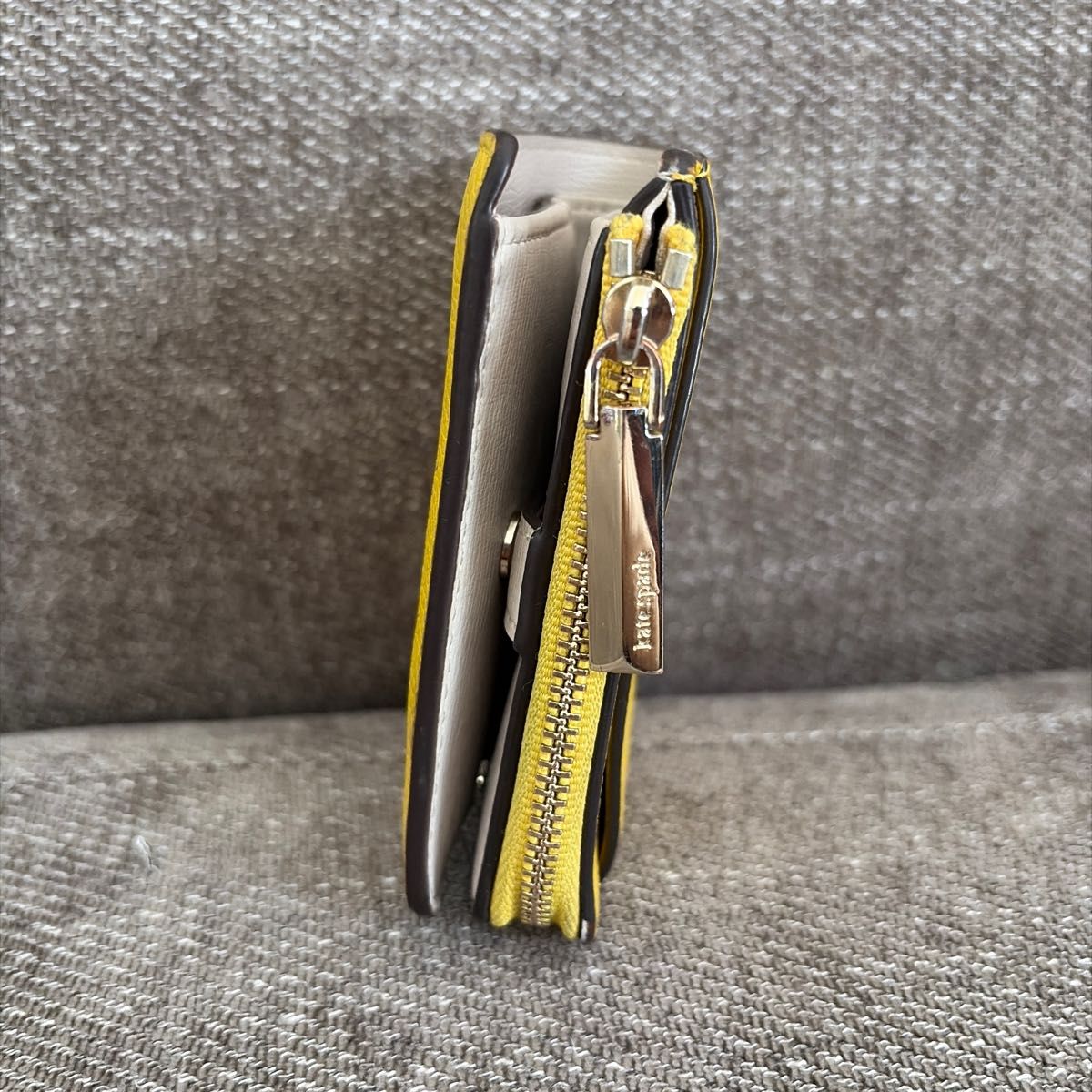 ケイトスペード 折りたたみ財布 黄色 kate spade new york イエロー