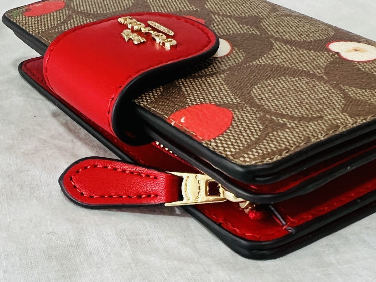 コーチ COACH 二つ折り財布 シグネチャー アップル プリント カーキ