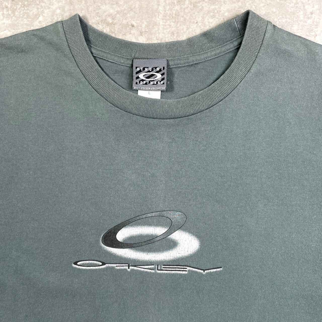 90年代 OAKLEY オークリー ロゴプリントTシャツ メンズL 古着 90s