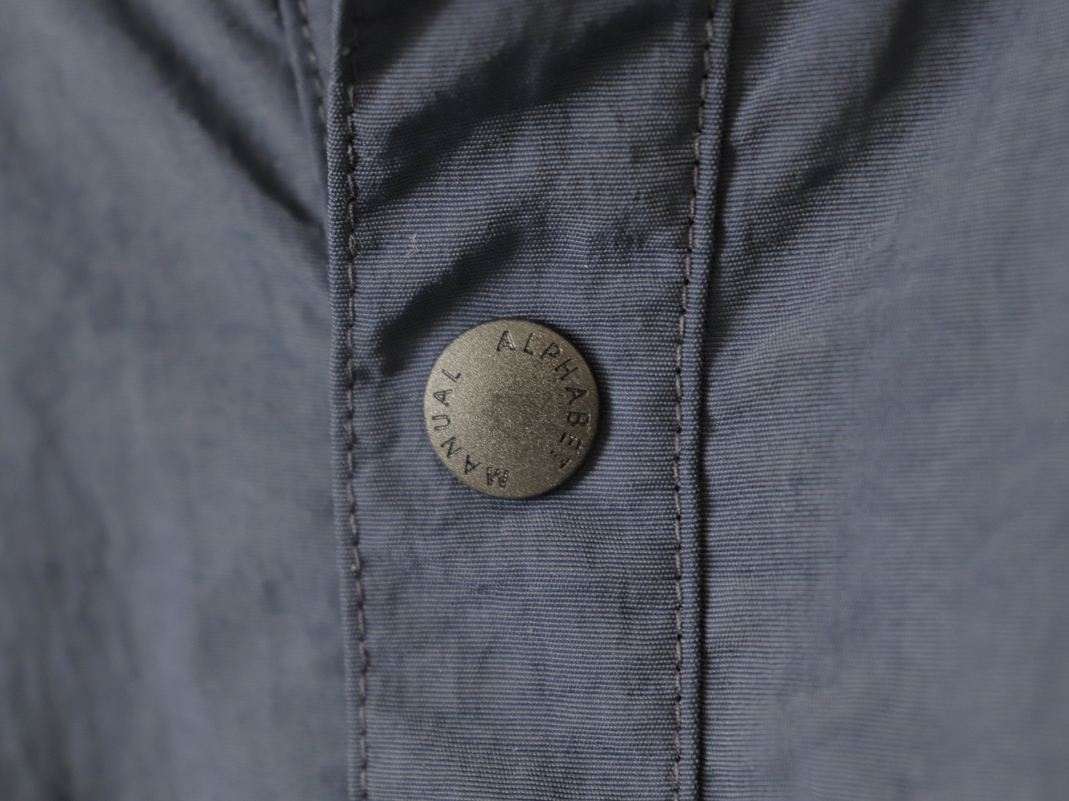 MANUAL ALPHABET / LIGHT SHELL SNAP TEE - NAVY マニュアル