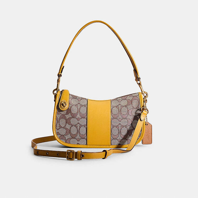 COACH® | Restored Swinger In Signature Jacquard