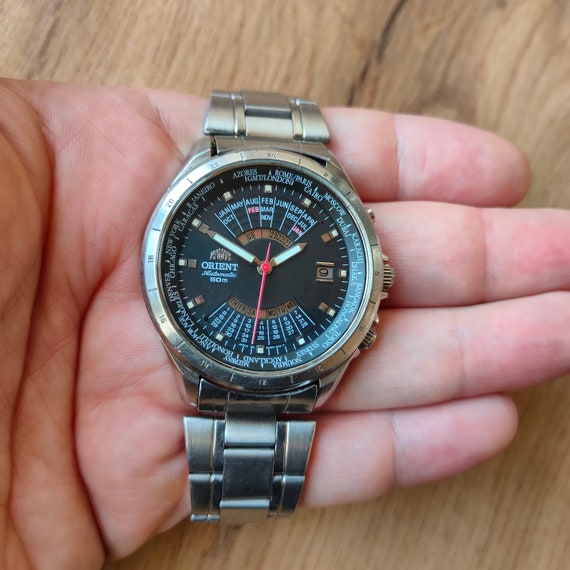Vintage Orient College Multi Year Calendar With World Time, Black