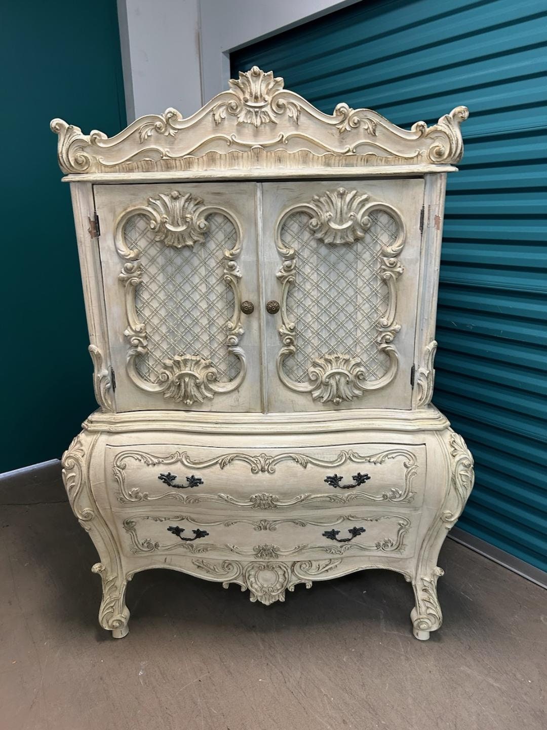 Vintage French Rococo Heavily Carved Wood and Chicken Wire Armoire