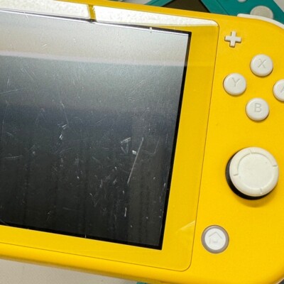 Refurbished Nintendo Switch Lite Coral Pink Console & Charger with