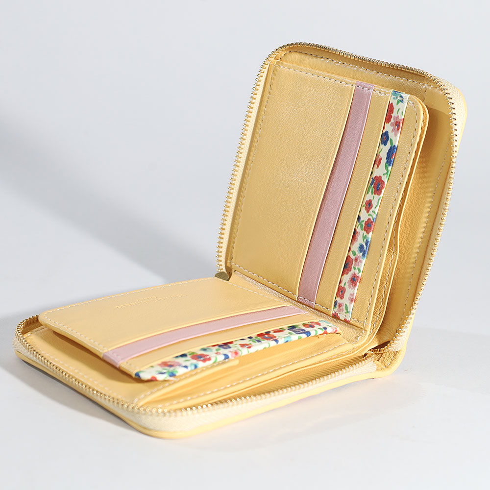 tsumori chisato CARRY エポネコメッシュ 二つ折り財布 | TOZAI NANBOKUYA