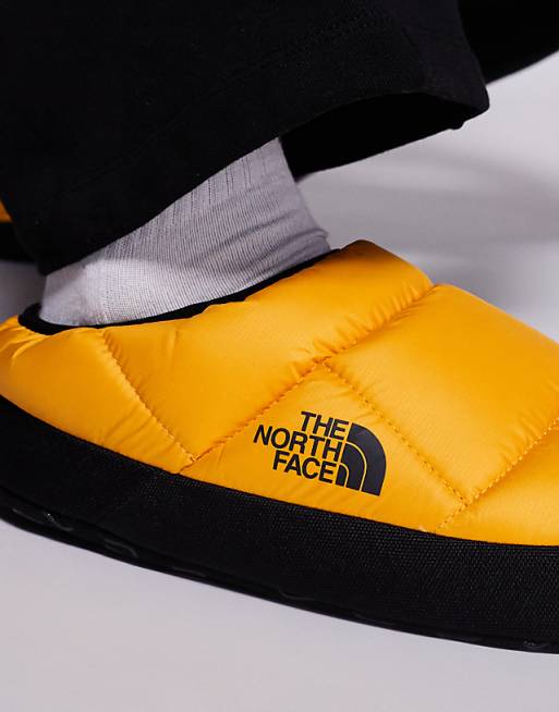 The North Face Tent insulated mules in yellow | ASOS