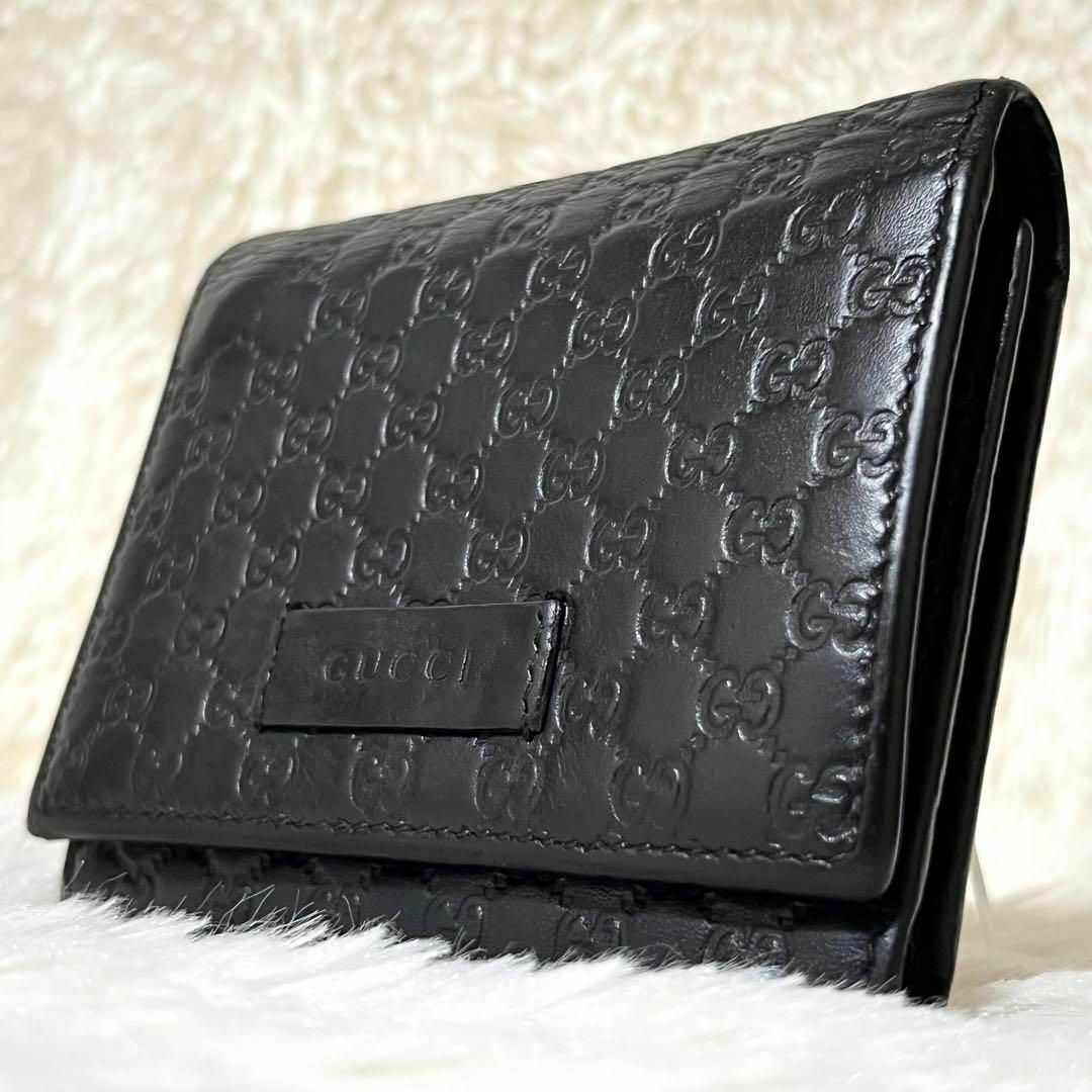 GUCCI - GUCCI 三つ折り 財布 マイクロシマ GG 革 ホック 黒 プレート