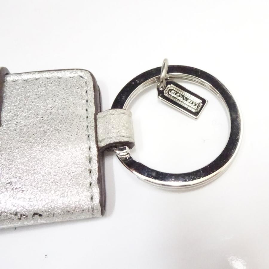 COACH（コーチ） 手帳型 バッグチャーム フォトケース スノーフレーク