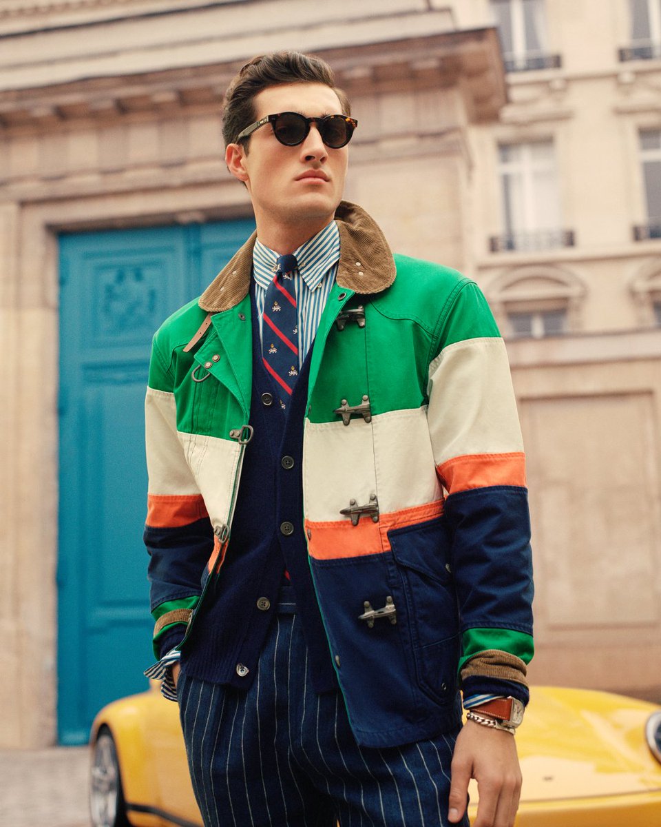 The Color-Blocked Canvas Jacket styled over classic tailoring for