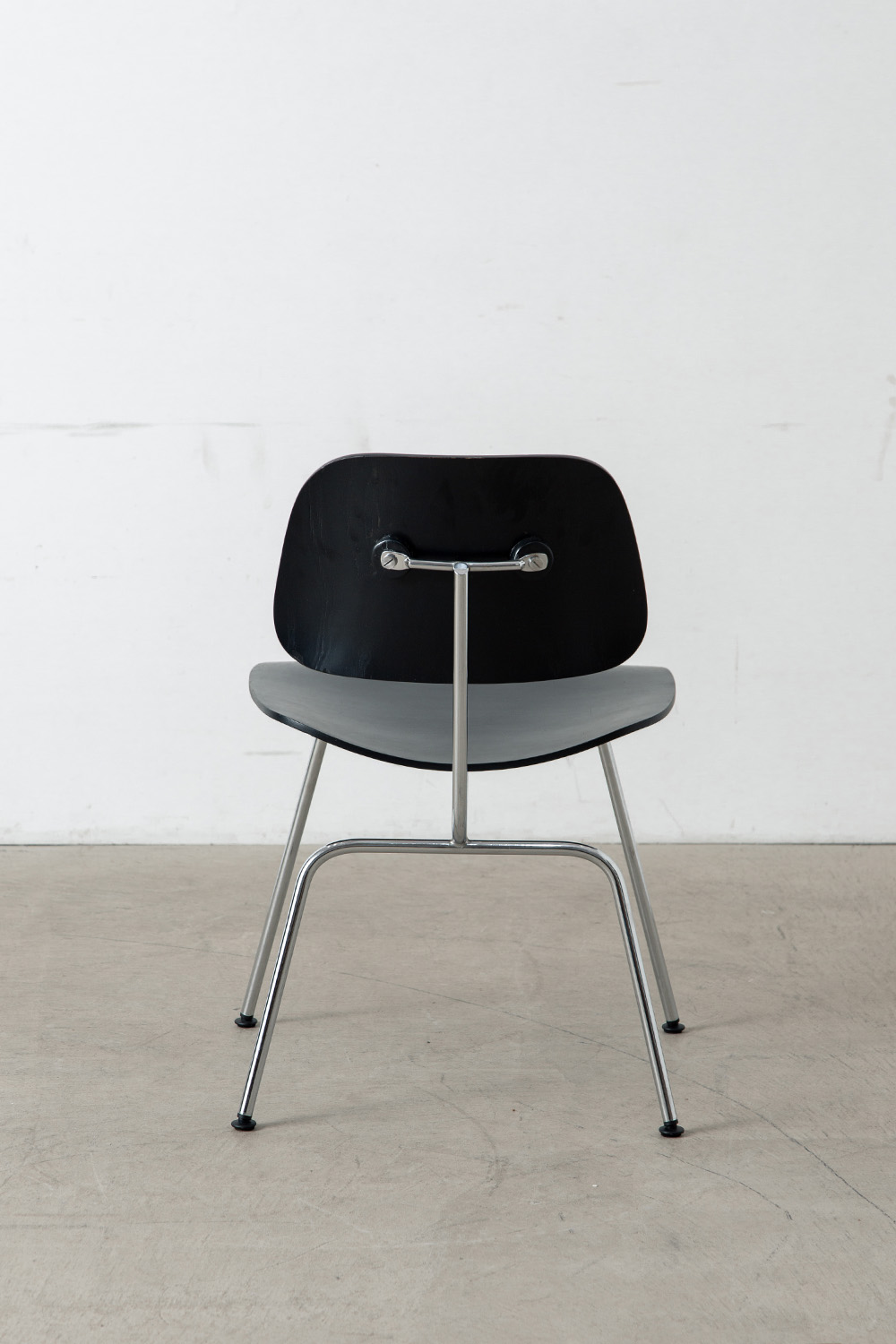 stoop | DCM Chair by Charles & Ray Eames for Herman Miller in