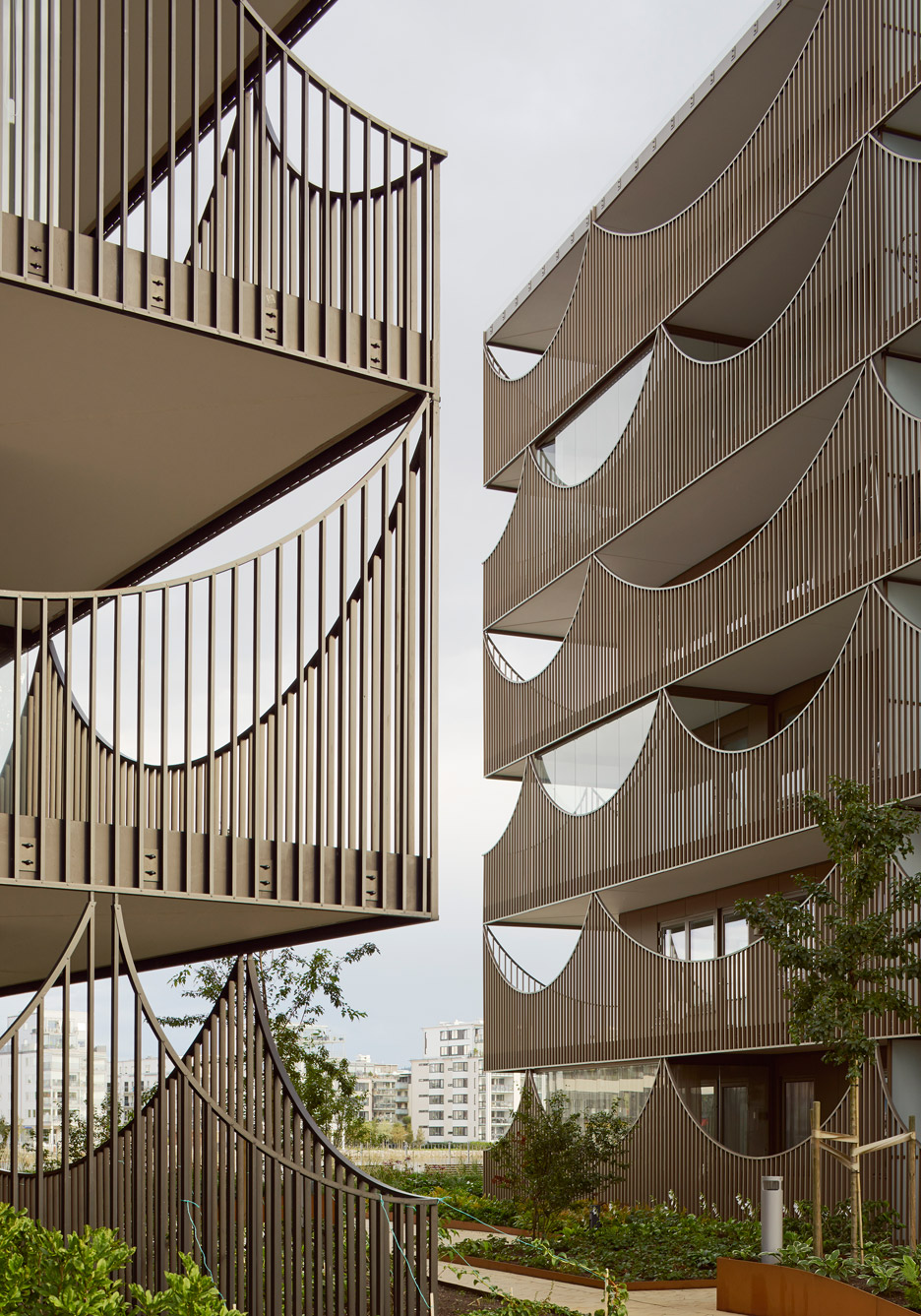 Tham & Videgård's Västra Kajen housing has rows of inverted arches