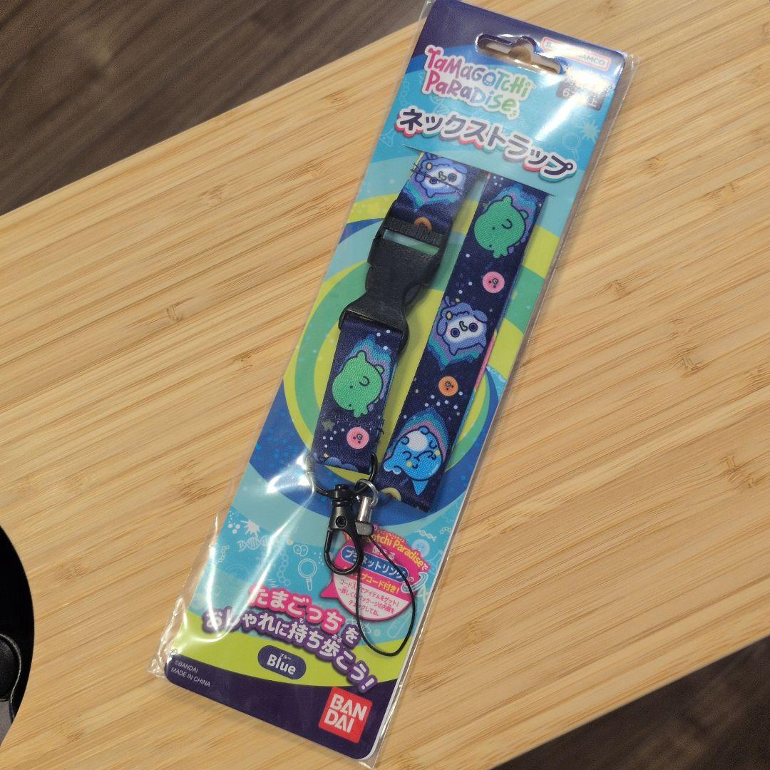 新品】たまごっちパラダイス ネックストラップ ブルー - メルカリ