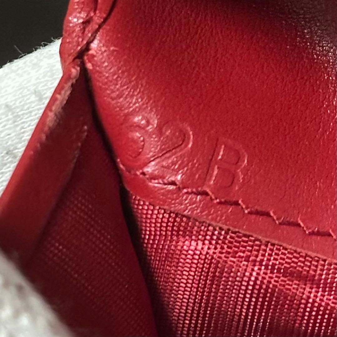 PRADA プラダ 折り財布 ゴールドロゴ シボ革 バイカラー 赤 黒 - メルカリ