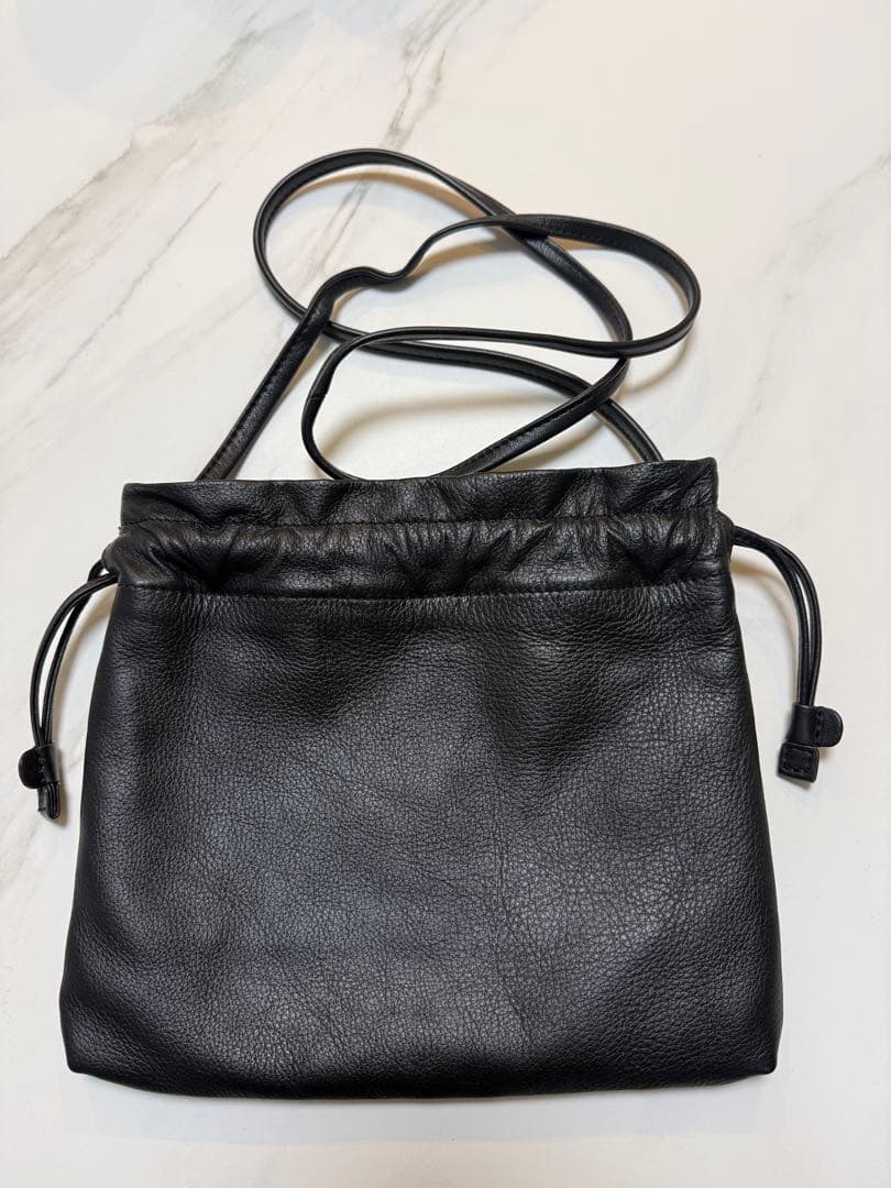 北欧、暮らしの道具店 仕分け上手なレザーの巾着ポシェット - メルカリ