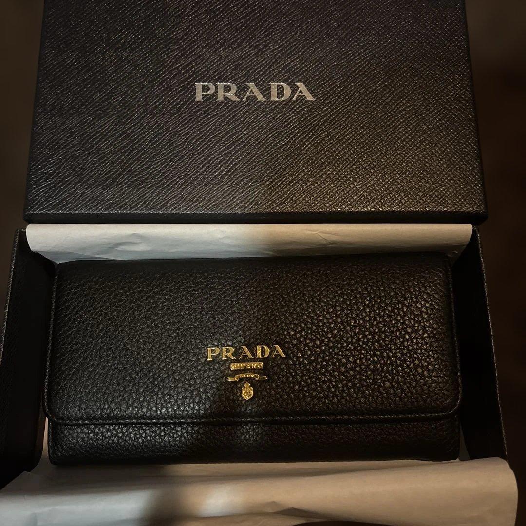プラダ長財布　二つ折り PRADA（プラダ） 【未使用】プラダ 長財布 二つ折り 三角ロゴ 黒