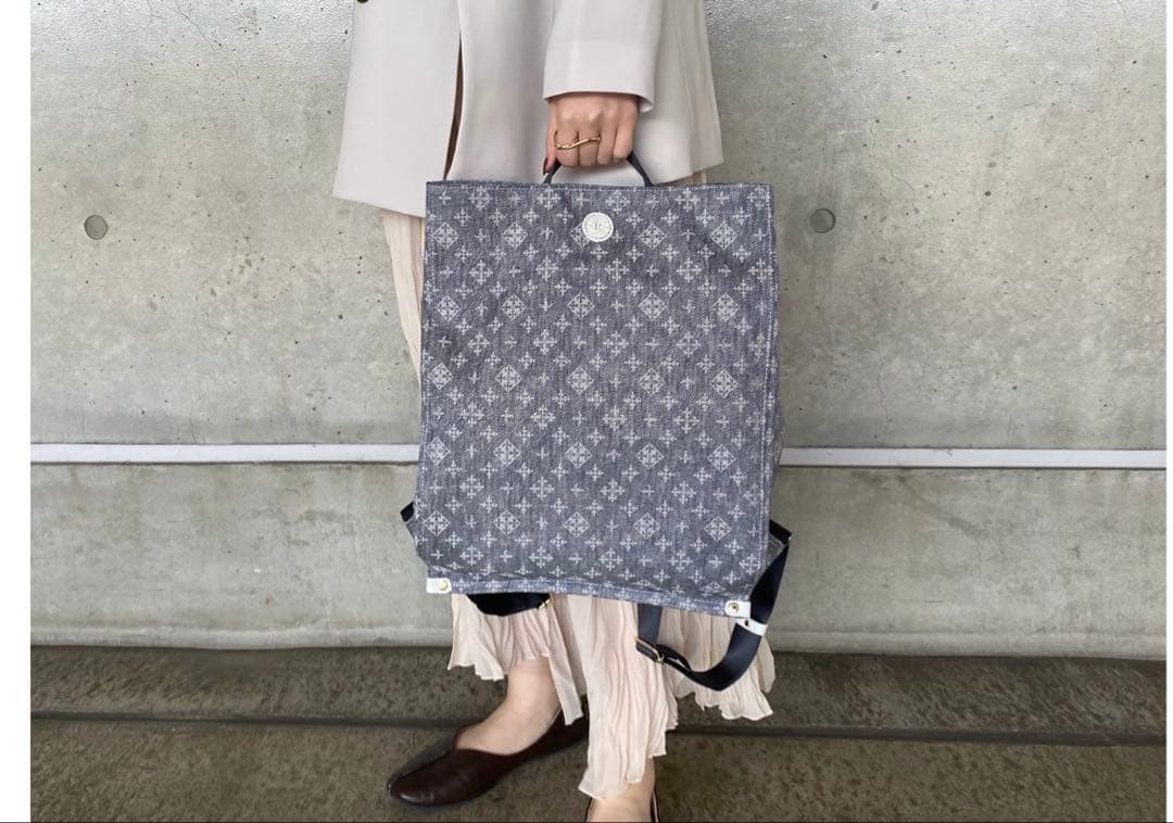 新品タグ有 極美品◇russet 折りたためるデニムプリント リュック