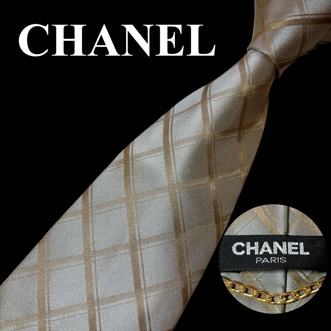 CHANEL シルクネクタイ シルバー×ゴールド ココマーク チェーン付